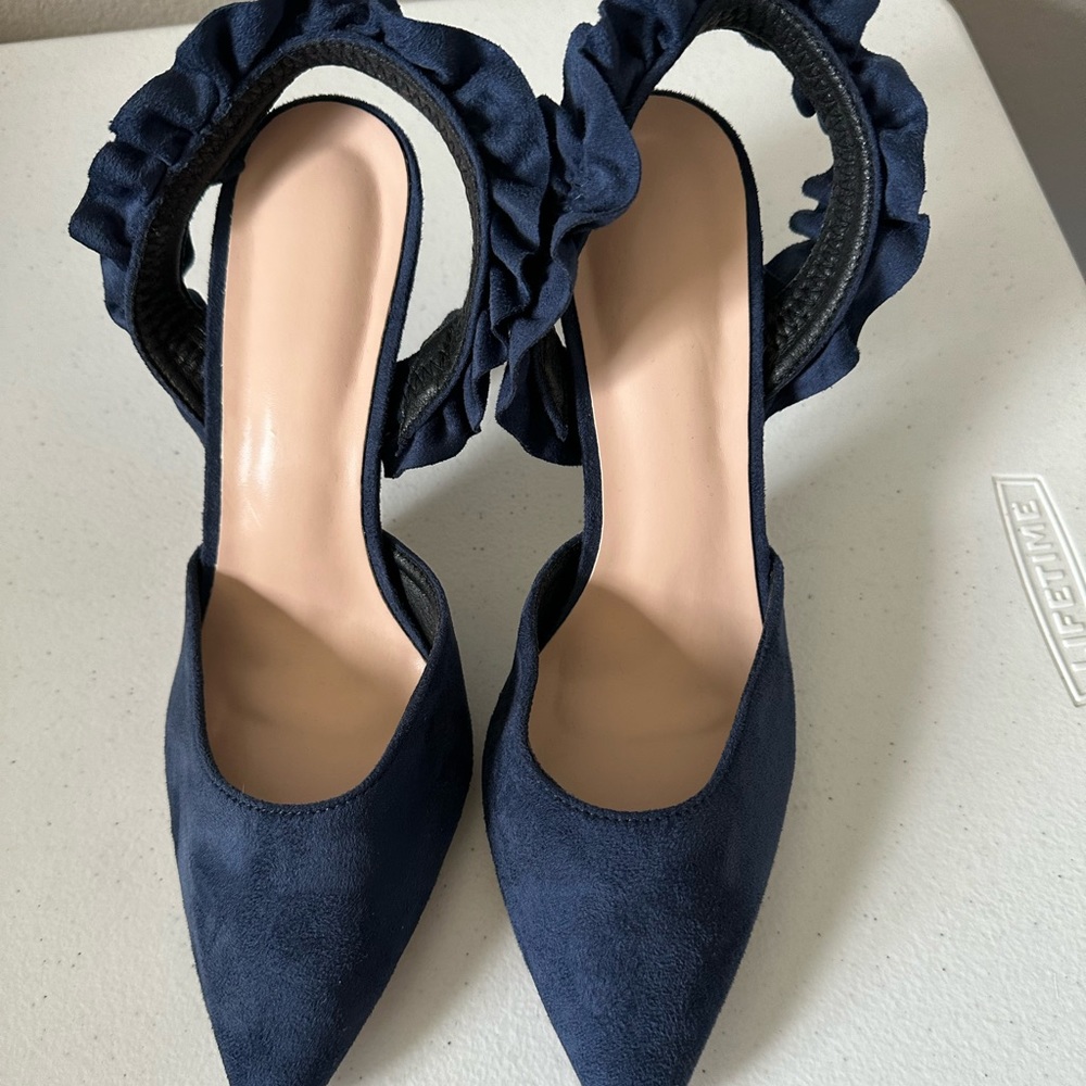 Navy Heels with Ruffled sling back.